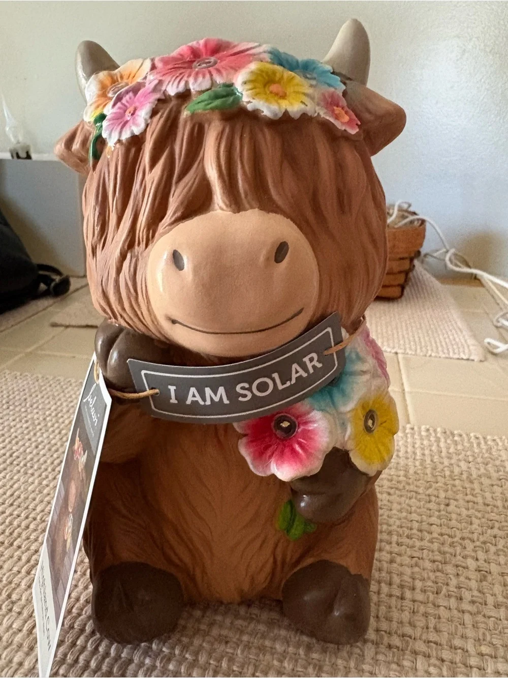 Solar-Powered Brown Highland Cow Lawn Accent with Floral Lights